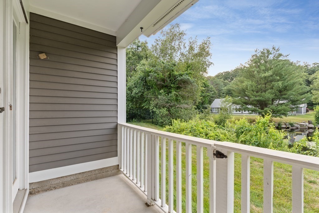 29 Ledgebrook Drive, Unit 29 Blackstone, MA 01504 - Photo 30 of 38 a view of a balcony with an outdoor space