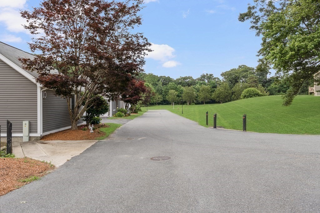 29 Ledgebrook Drive, Unit 29 Blackstone, MA 01504 - Photo 33 of 38 a view of a street with a house in the background
