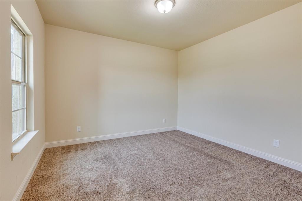 336 Red Hill Road Sunnyvale, TX 75182 - Photo 28 of 36 an empty room with a window