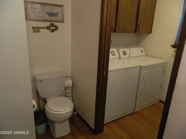 a bathroom with a toilet and a sink