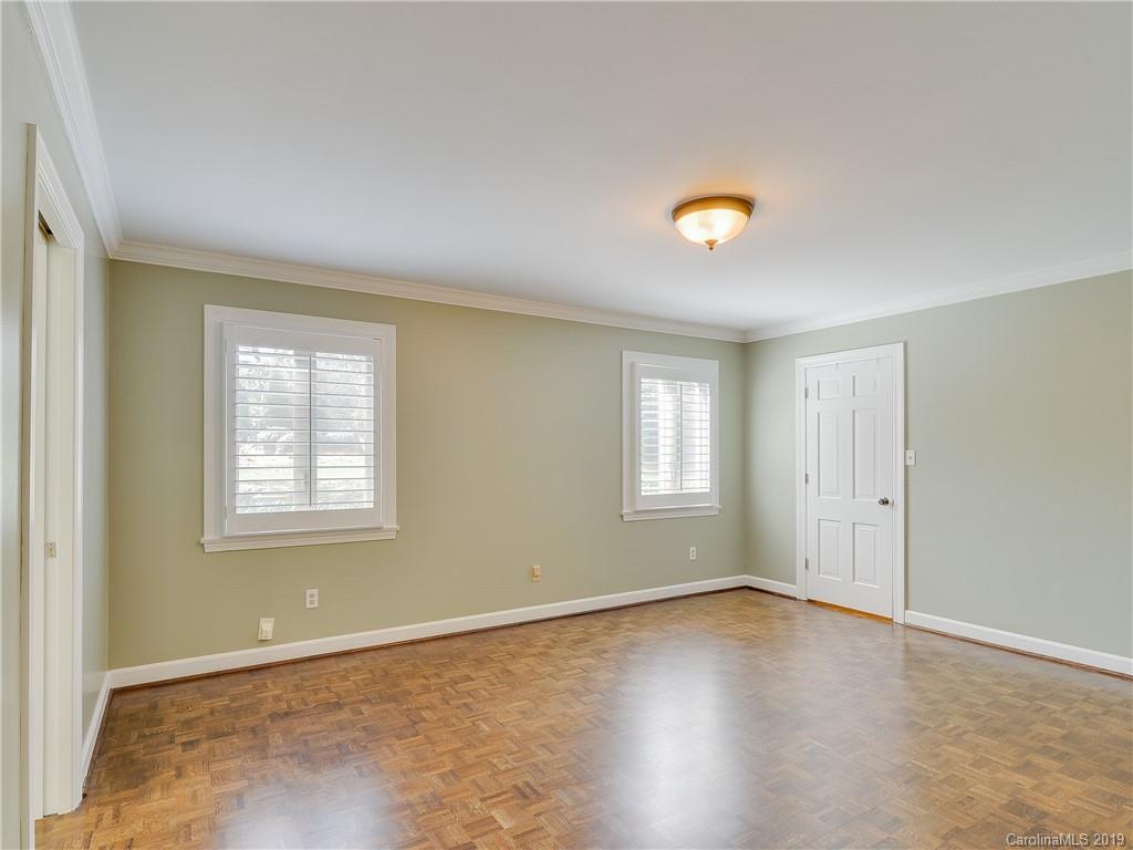 3108 Colony Road Charlotte, NC 28211 - Photo 14 of 36 an empty room with windows and mirror