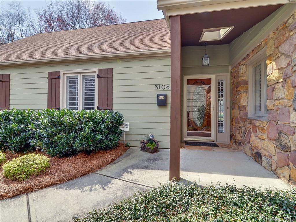3108 Colony Road Charlotte, NC 28211 - Photo 5 of 36 a front view of a house with a yard