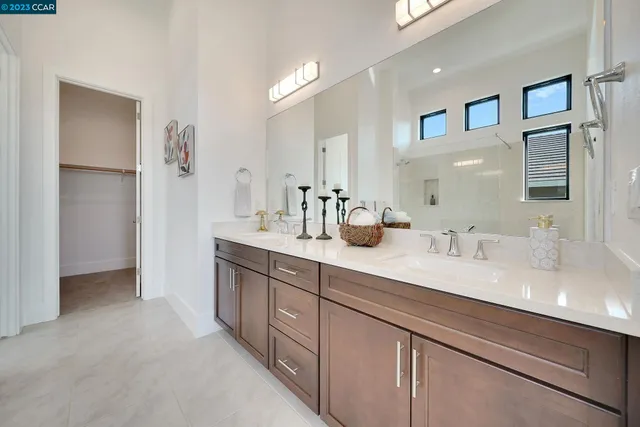 a bathroom with a sink and mirror