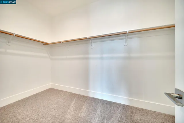 a view of a livingroom with furniture and windows