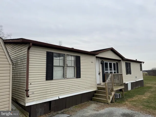 a house that has a window in front of it