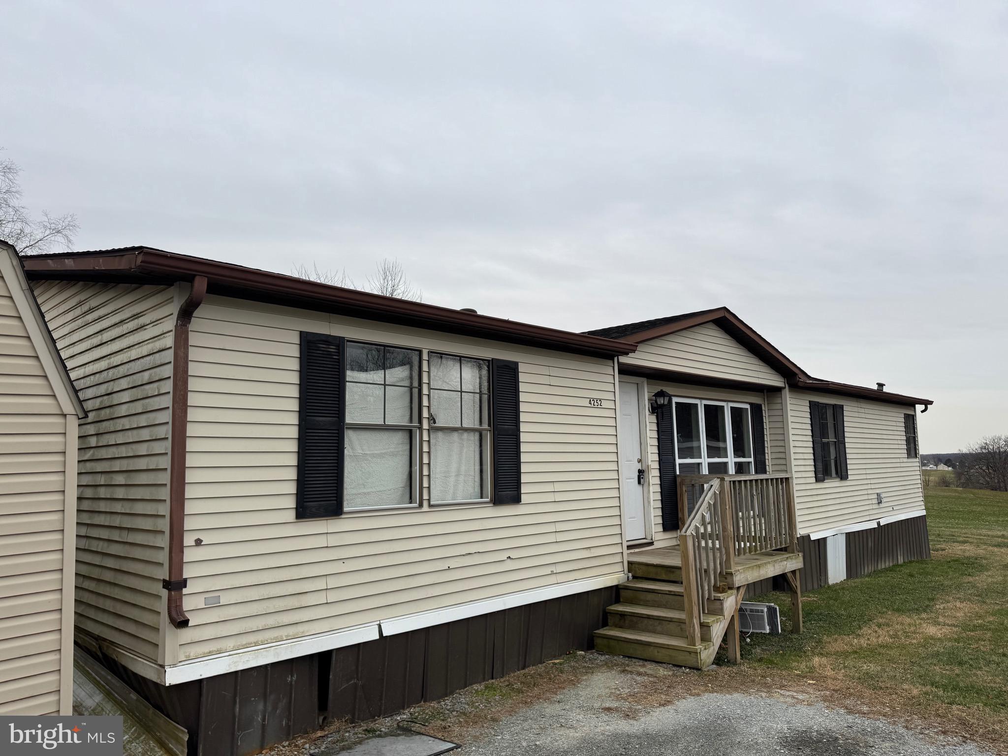 a house that has a window in front of it