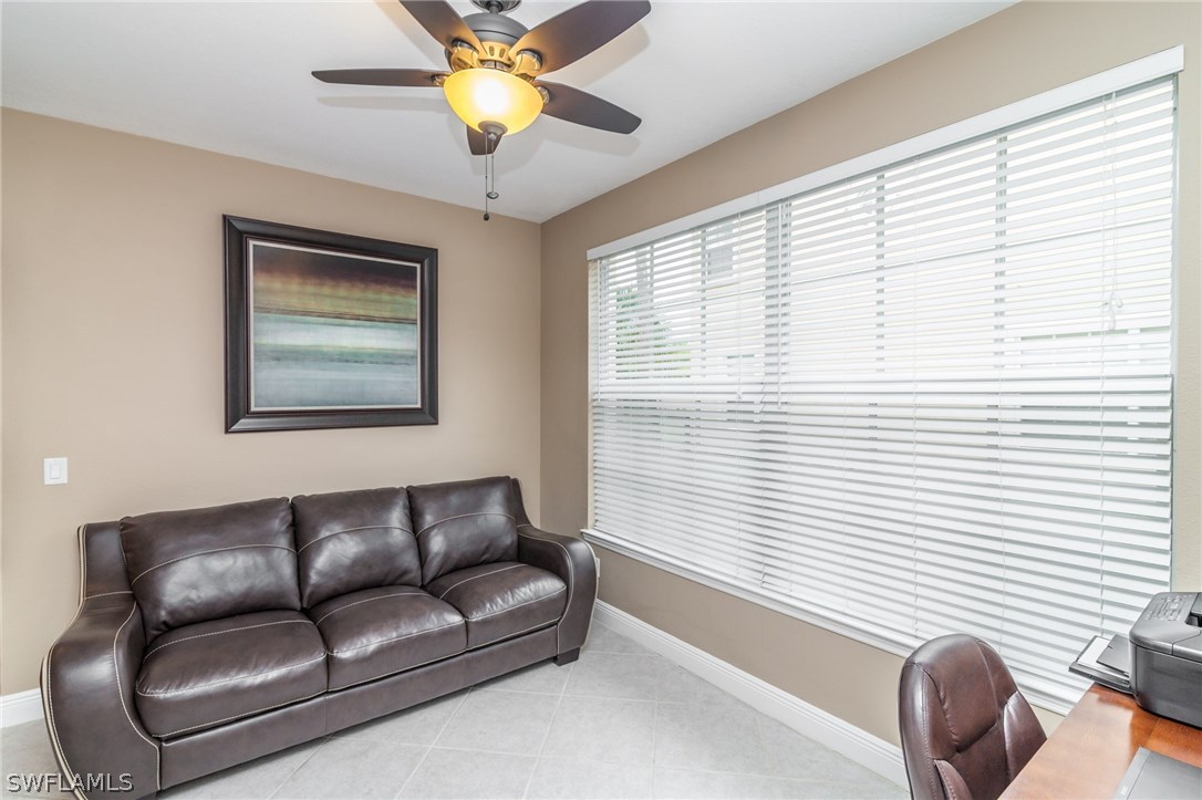 3968 Cherrybrook Loop Fort Myers, FL 33966 - Photo 16 of 16 a living room with furniture and a window
