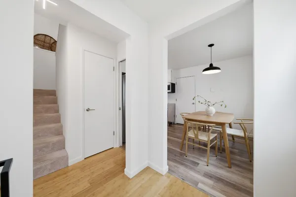 a kitchen with stainless steel appliances a refrigerator sink and cabinets