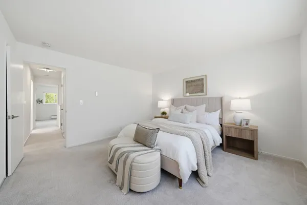 a bathroom with a bath tub with a shower