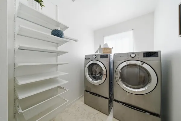 a view of a roof deck with couches
