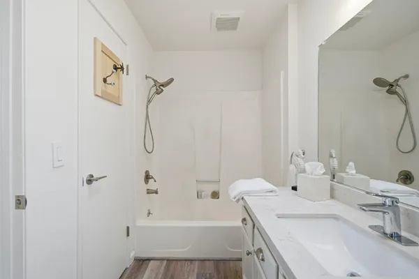 a view of a chairs on the roof deck