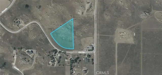 a view of a room with a ceiling fan