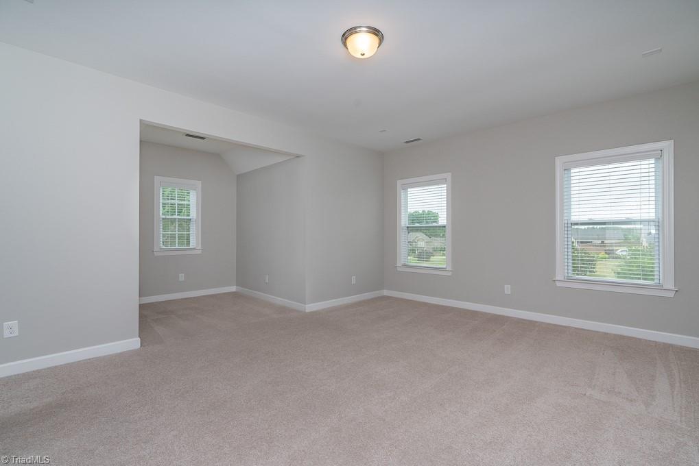 8200 Brotherstwo Road Colfax, NC 27235 - Photo 20 of 50 This well designed space is located just off the garage. Powder room is tastefully located further away from entertaining and living areas. Drop zone is the perfect spot for hanging jackets, bags, and storing shoes.
