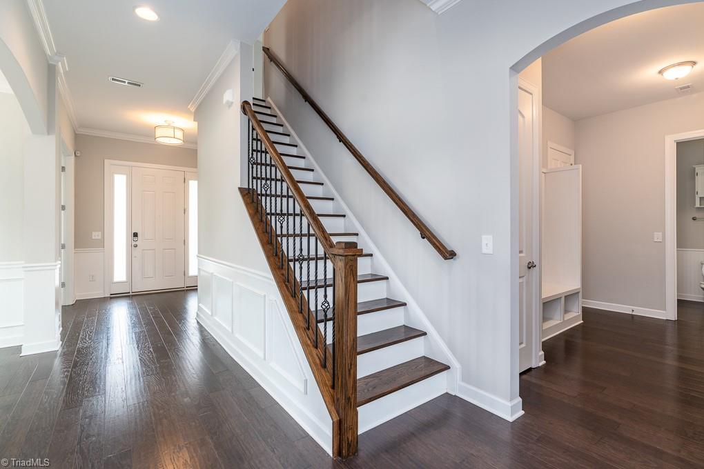 8200 Brotherstwo Road Colfax, NC 27235 - Photo 6 of 50 This room could be used as a home office or school room, formal living room, or more! French doors allow privacy if needed or look nice standing open. Two large windows let in lots of natural light. Coffered ceilings add a luxurious feel.