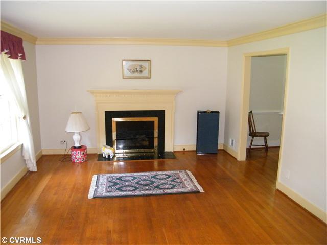 8342 Chelmford Road North Chesterfield, VA 23235 - Photo 2 of 12 Living Room - IT LIGHT AND BRIGHT! WITH BEAUTIFUL HARDWOODS, FIREPLACE HAS GAS LOGS