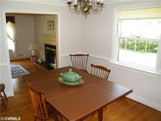 8342 Chelmford Road North Chesterfield, VA 23235 - Photo 3 of 12 Dining Room - BEAUTIFUL HARDWOODS AND OVERSIZED WINDOW MAKES IT LIGHT AND BRIGHT