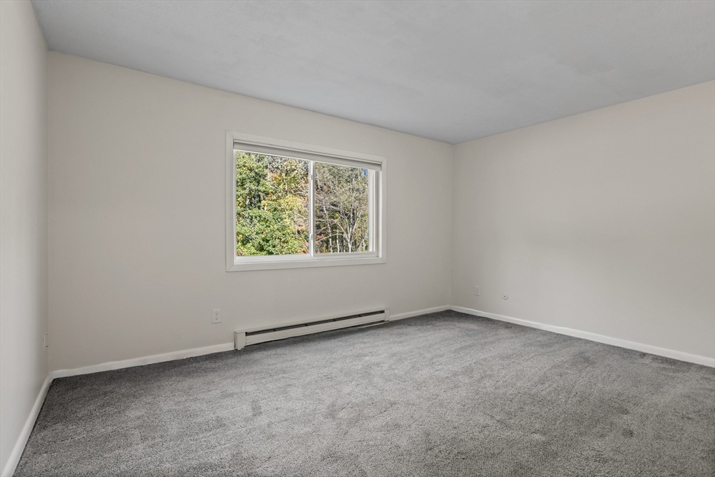 5 Turnpike Road, Unit 229 Townsend, MA 01469 - Photo 11 of 20 an empty room with a window