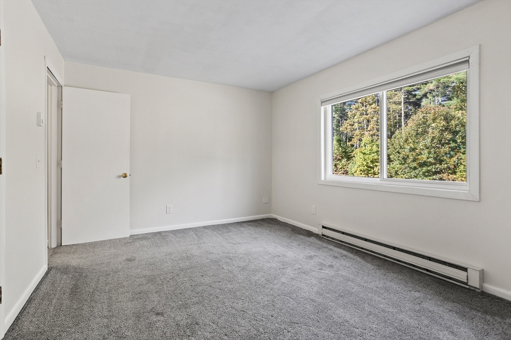 5 Turnpike Road, Unit 229 Townsend, MA 01469 - Photo 12 of 20 an empty room with a window
