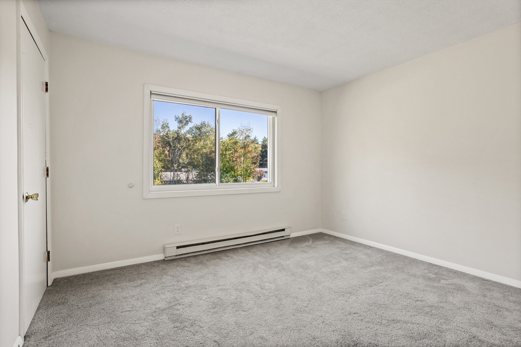 5 Turnpike Road, Unit 229 Townsend, MA 01469 - Photo 13 of 20 an empty room with a window