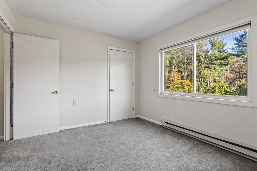 5 Turnpike Road, Unit 229 Townsend, MA 01469 - Photo 14 of 20 a view of an empty room with a window