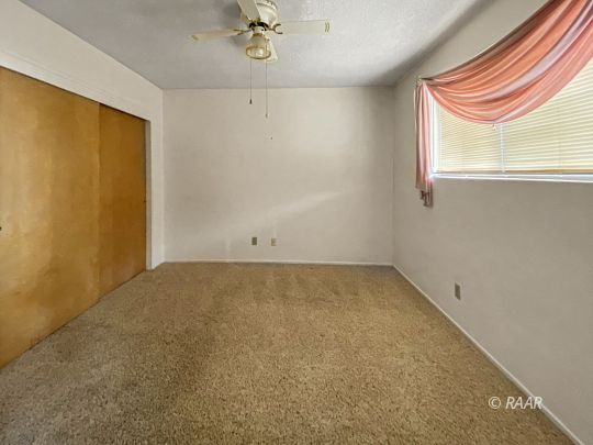 312 North Norma Street Ridgecrest, CA 93555 - Photo 14 of 18 an empty room with a window