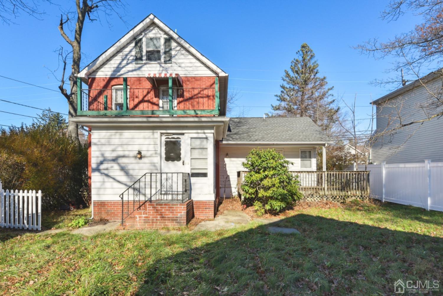 711 Old Post Road Edison, NJ 08817 - Photo 1 of 27 front view of a house with a yard