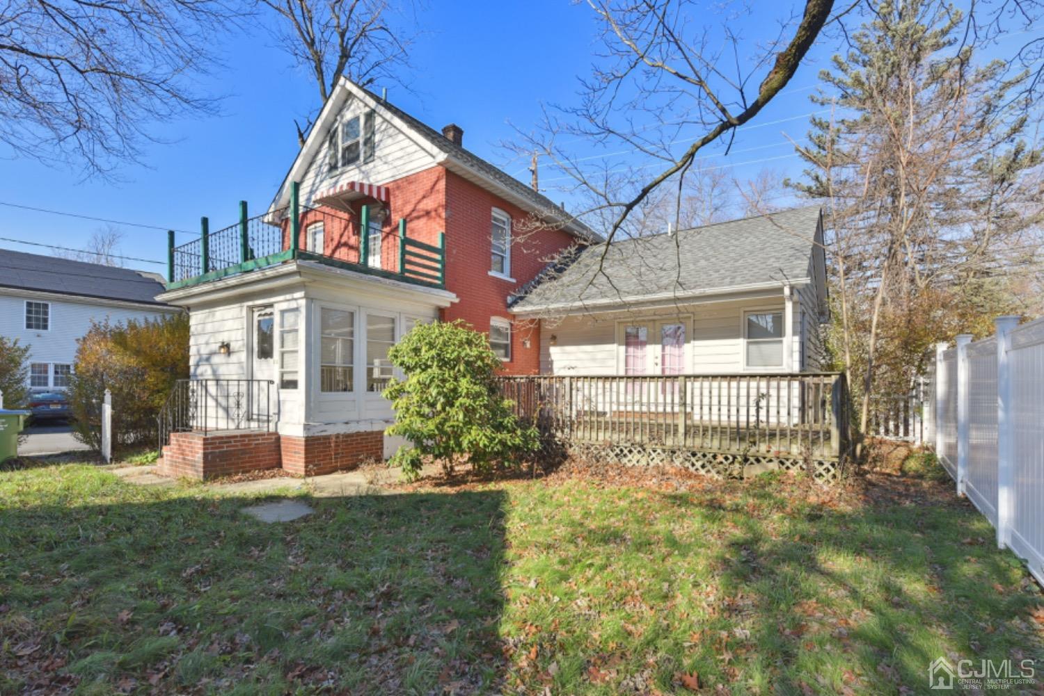 711 Old Post Road Edison, NJ 08817 - Photo 2 of 27 a front view of a house with garden