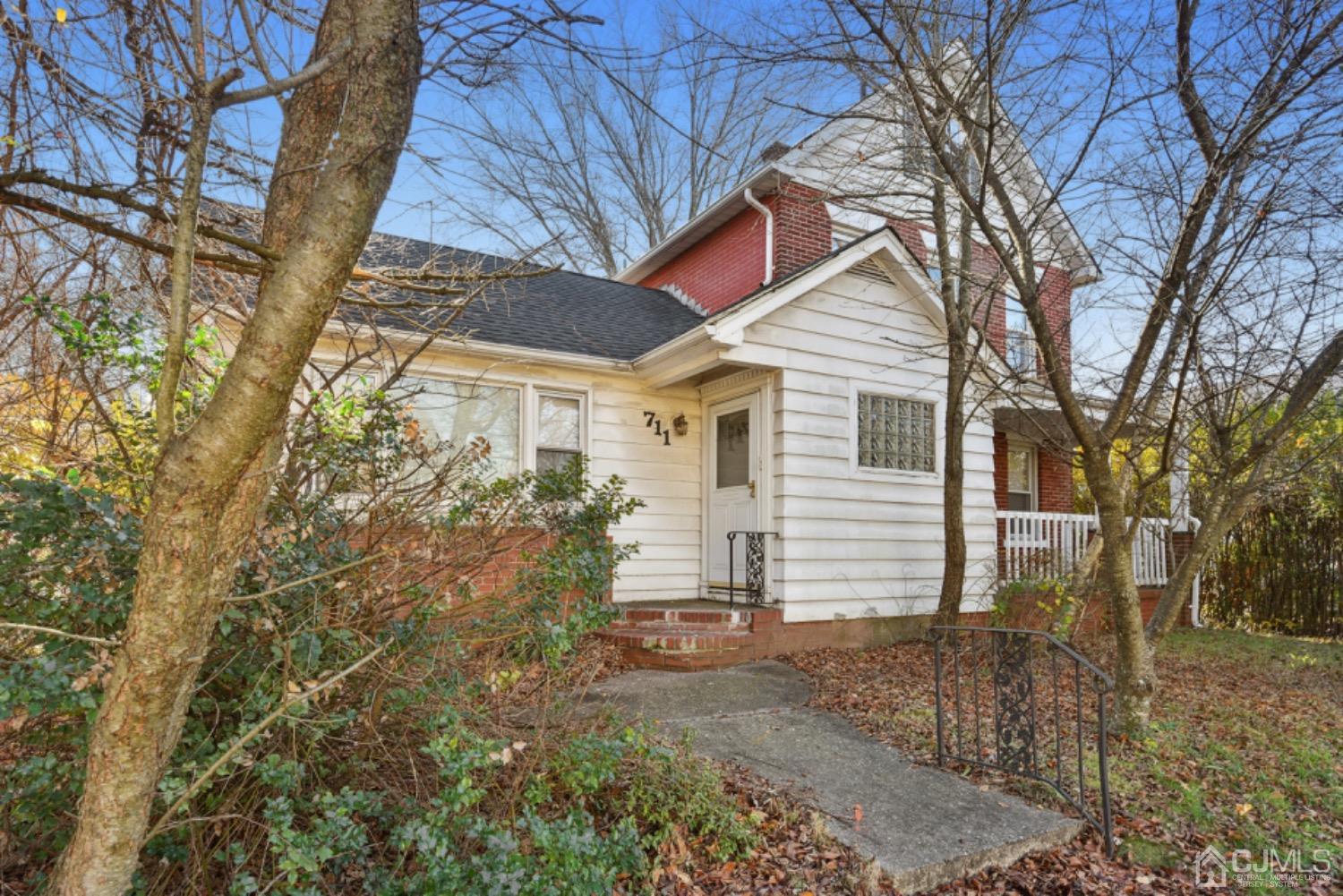 711 Old Post Road Edison, NJ 08817 - Photo 5 of 27 a view of a house with a yard