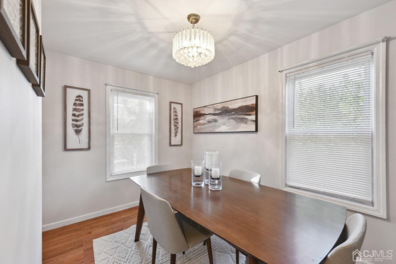 711 Old Post Road Edison, NJ 08817 - Photo 8 of 27 a view of a dining room with a table and chairs