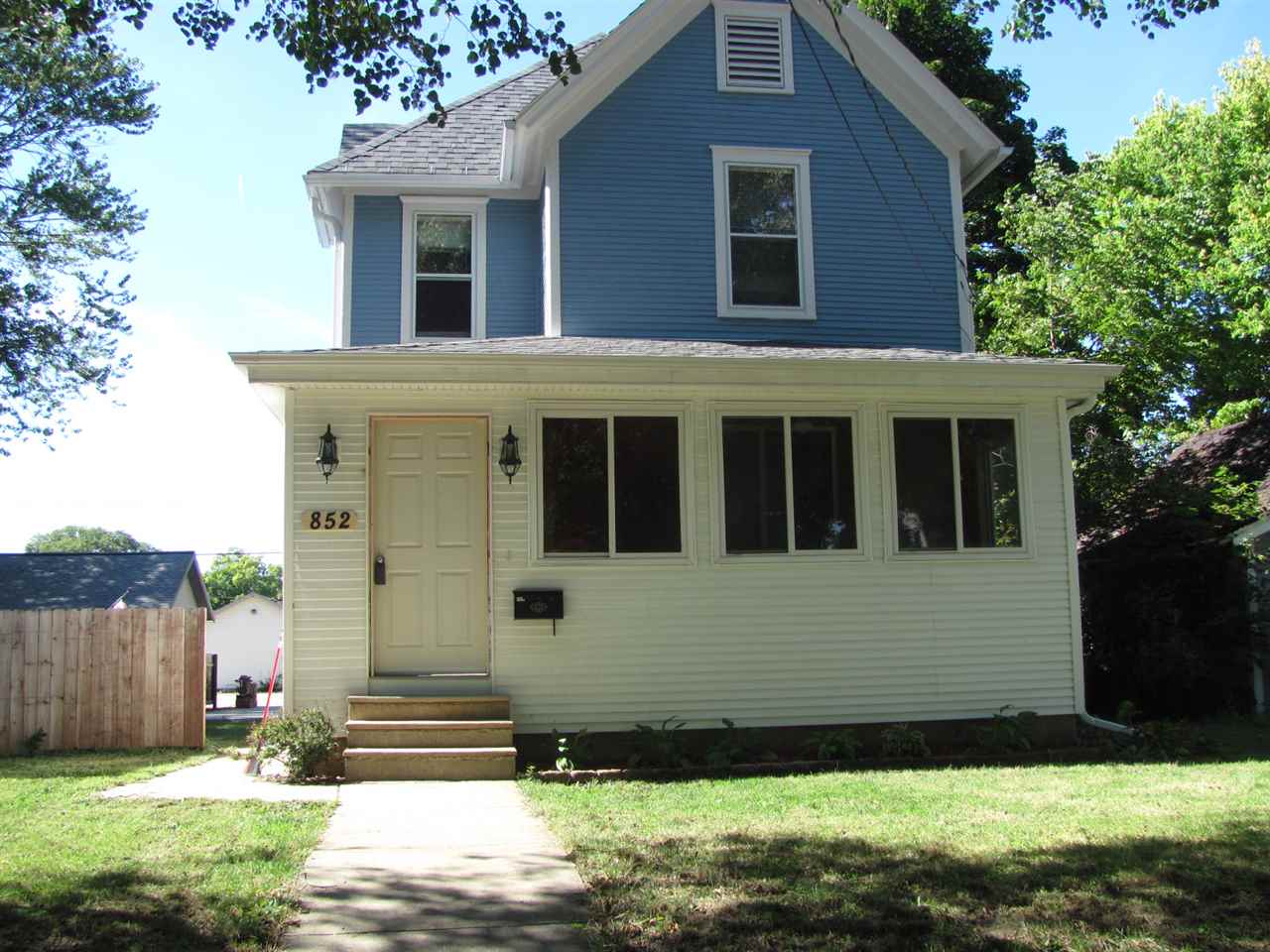 a view front of house with a yard