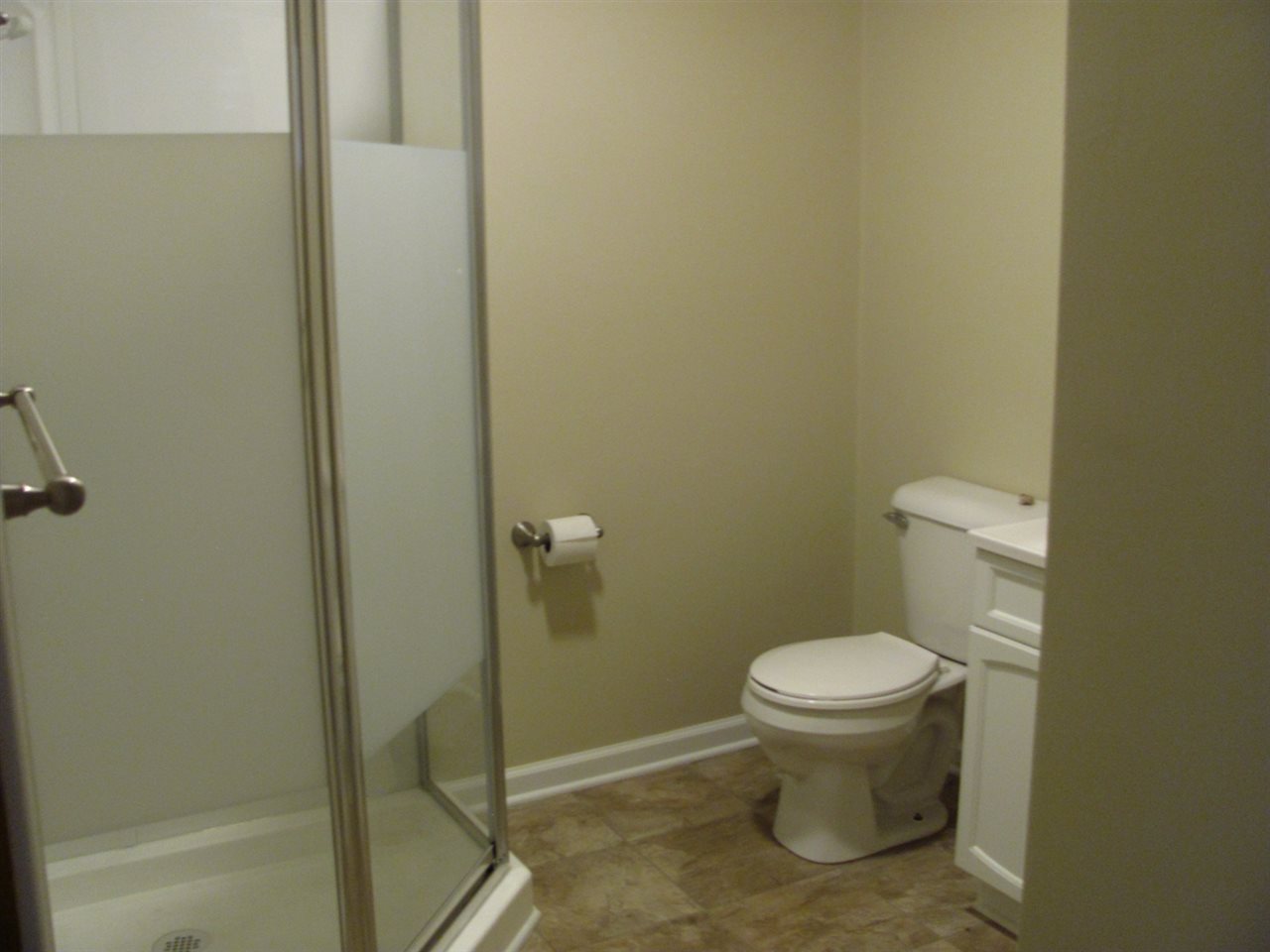 852 10th Street Beloit, WI 53511 - Photo 13 of 20 a bathroom with a sink and a toilet