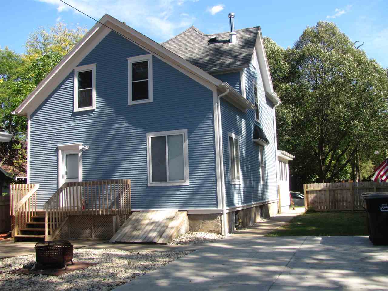 852 10th Street Beloit, WI 53511 - Photo 2 of 20 a front view of a house with a yard