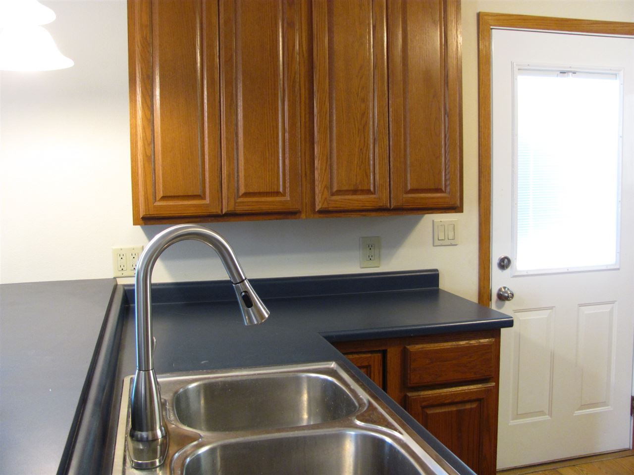 852 10th Street Beloit, WI 53511 - Photo 3 of 20 a close view of sink and tap