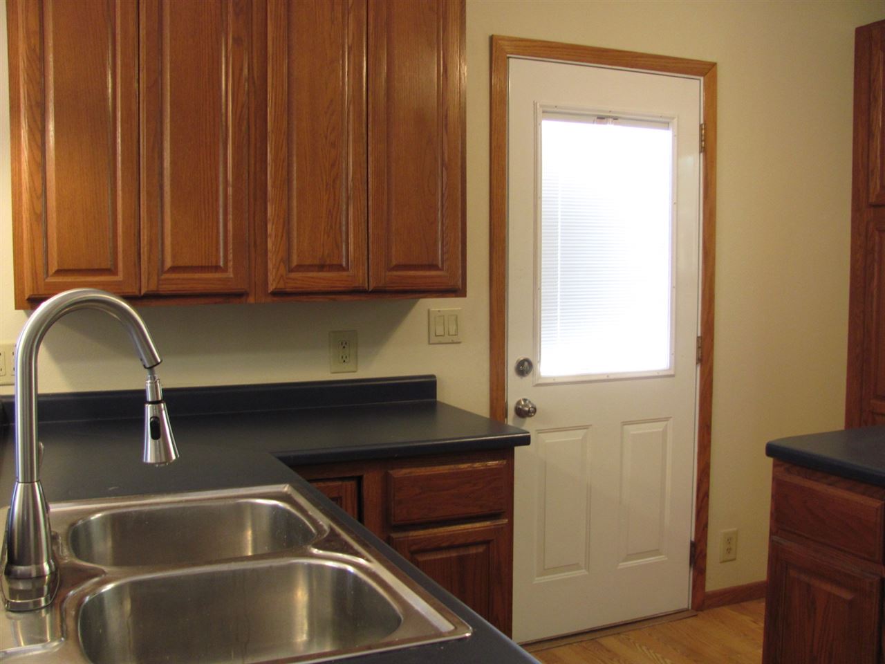 852 10th Street Beloit, WI 53511 - Photo 6 of 20 a close view of a sink and a cabinet in the kitchen