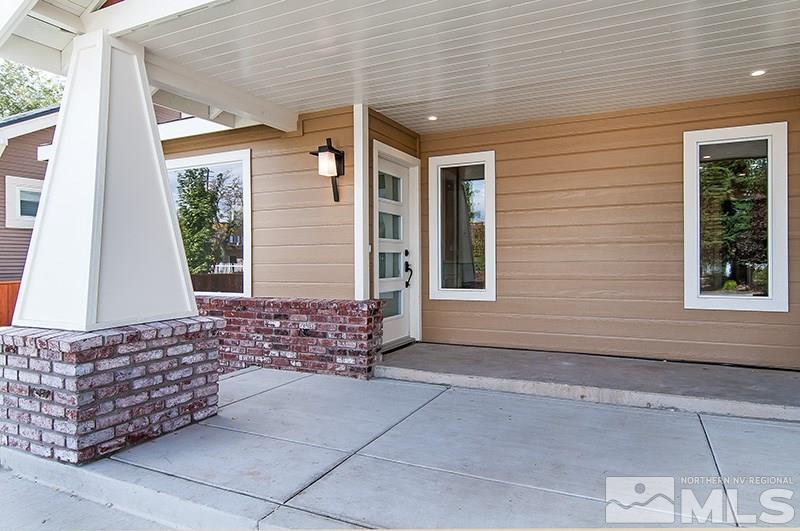 72 Caliente Street Reno, NV 89509 - Photo 12 of 12 a front view of a house with lots of green space