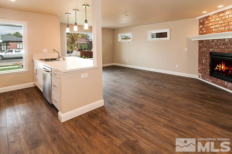 72 Caliente Street Reno, NV 89509 - Photo 3 of 12 a utility room with washer and dryer