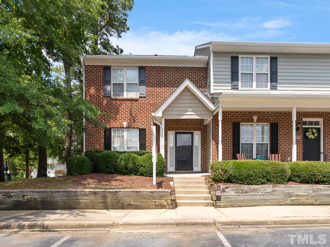8706 Leeds Forest Lane Raleigh, NC 27615 - Photo 1 of 22 front view of a brick house