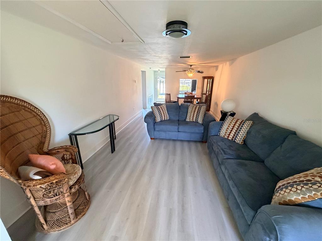 4446 Rustic Drive, Unit E New Port Richey, FL 34652 - Photo 4 of 12 a living room with furniture