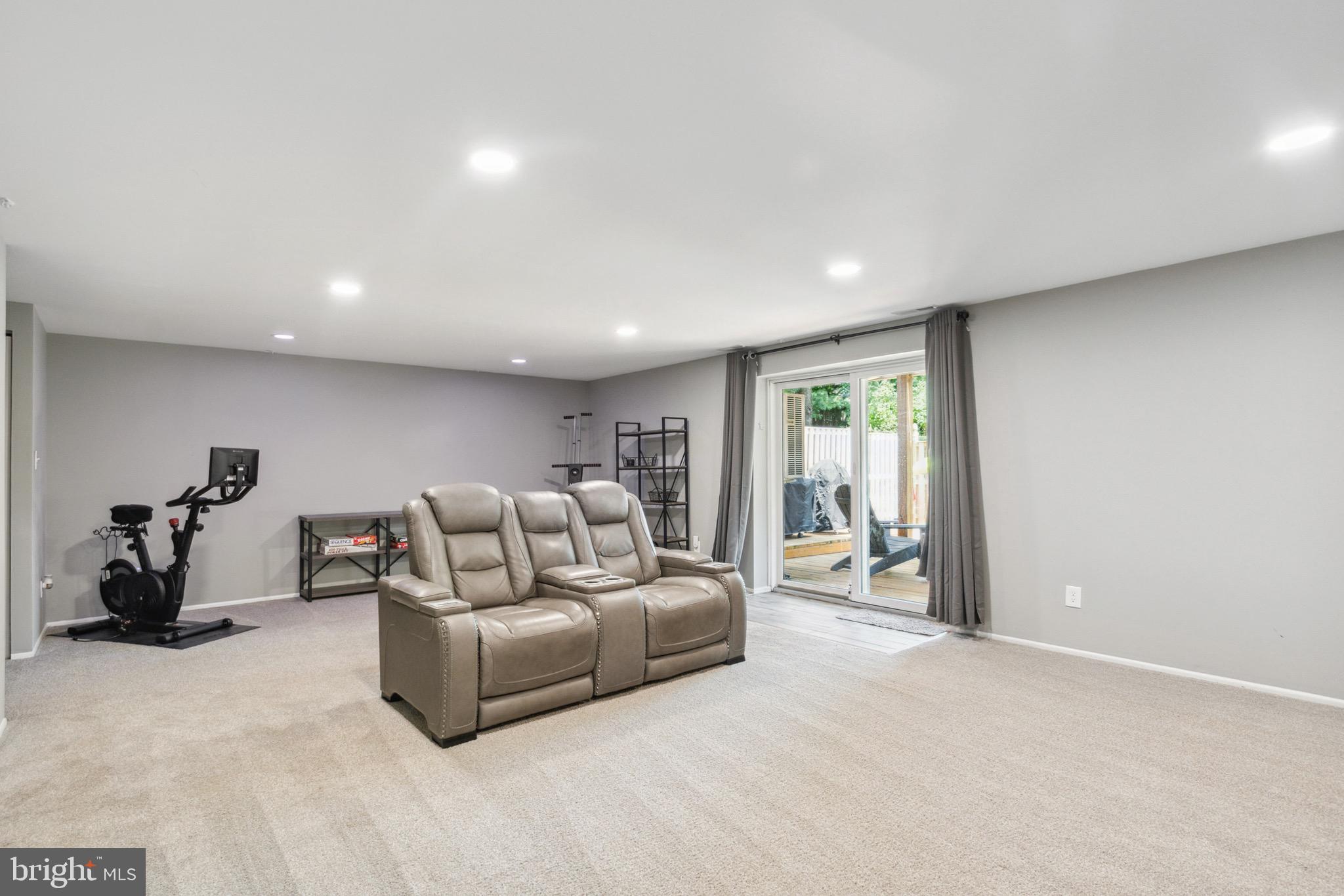 2314 Wonderview Road Lutherville-Timonium, MD 21093 - Photo 36 of 46 Lower Level Family Room with Slider to Rear Yard
