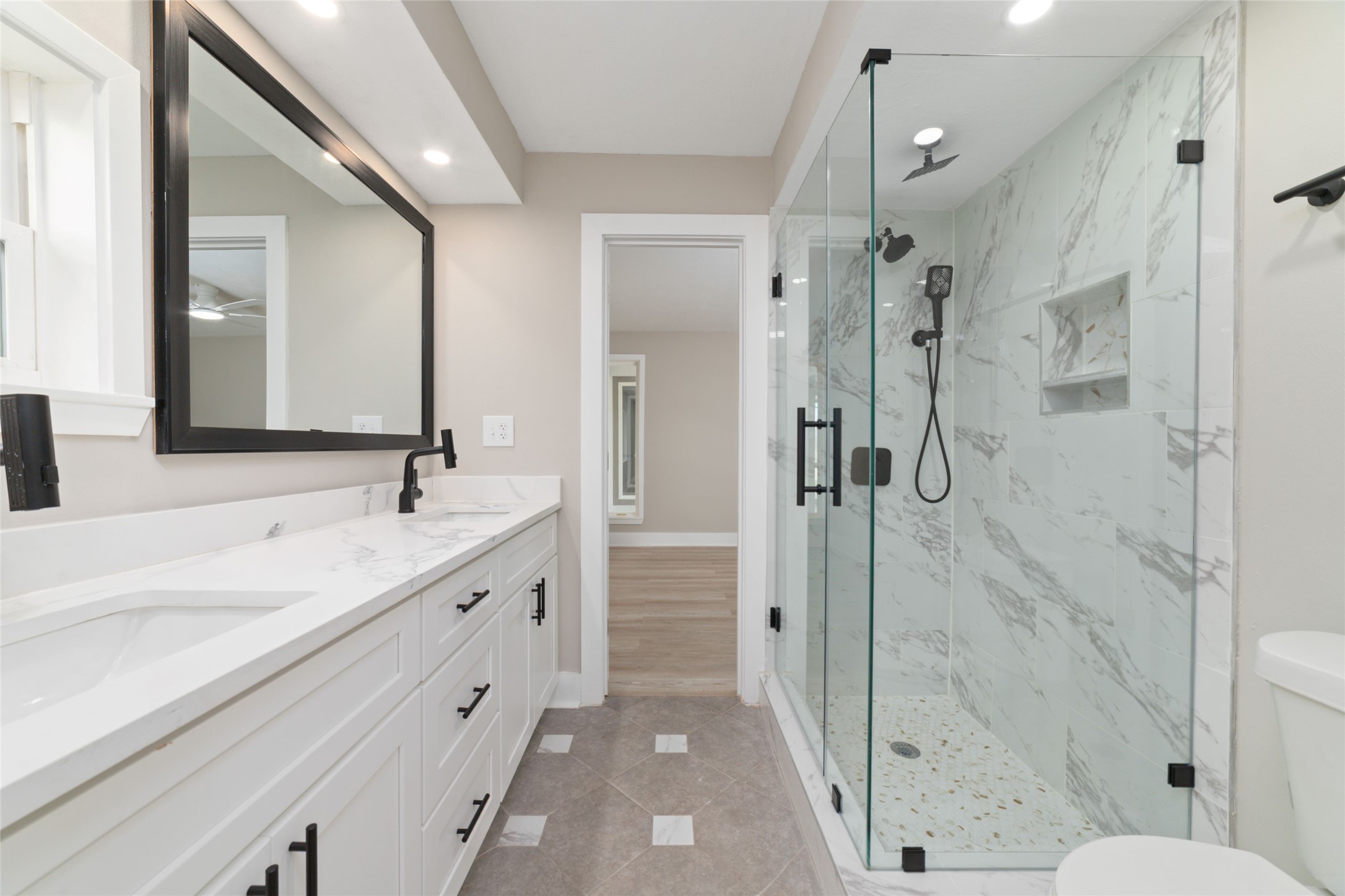 13431 Vrlla Road Guy, TX 77444 - Photo 15 of 32 a spacious bathroom with a shower sink and mirror