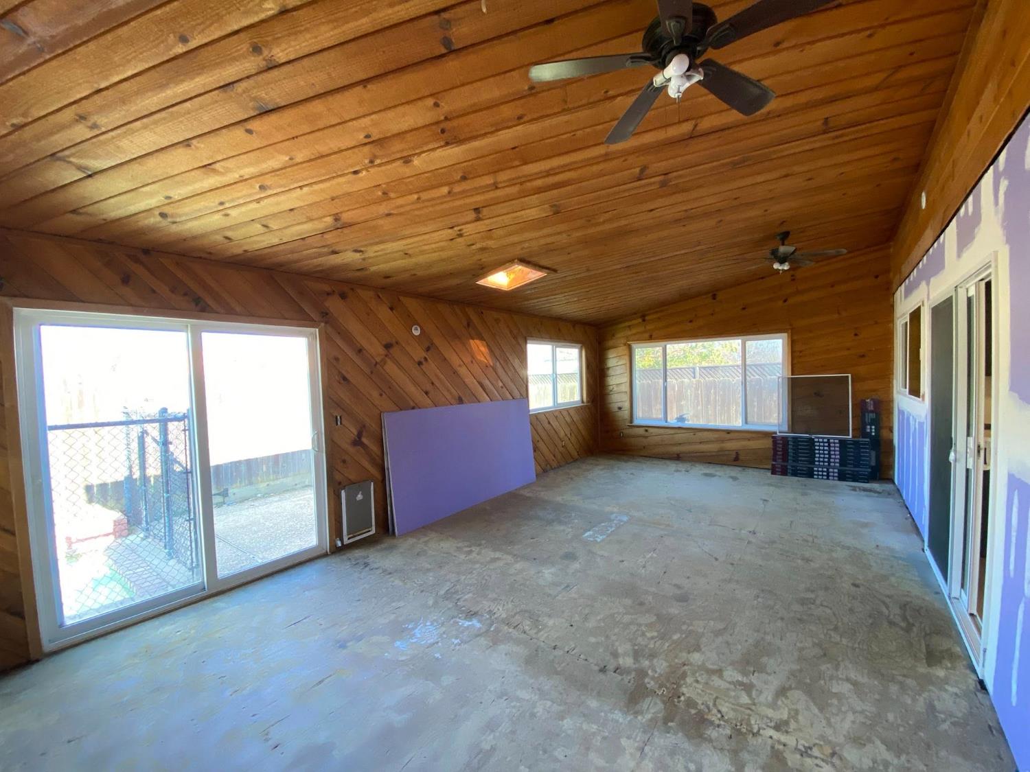 1201 Chateaugay Drive Modesto, CA 95356 - Photo 19 of 32 a view of an empty room with a fireplace