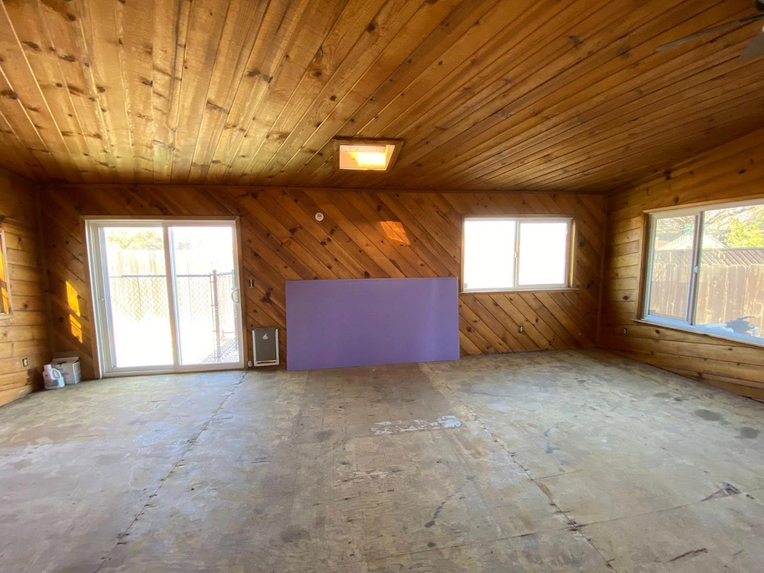 1201 Chateaugay Drive Modesto, CA 95356 - Photo 20 of 32 an empty room with windows