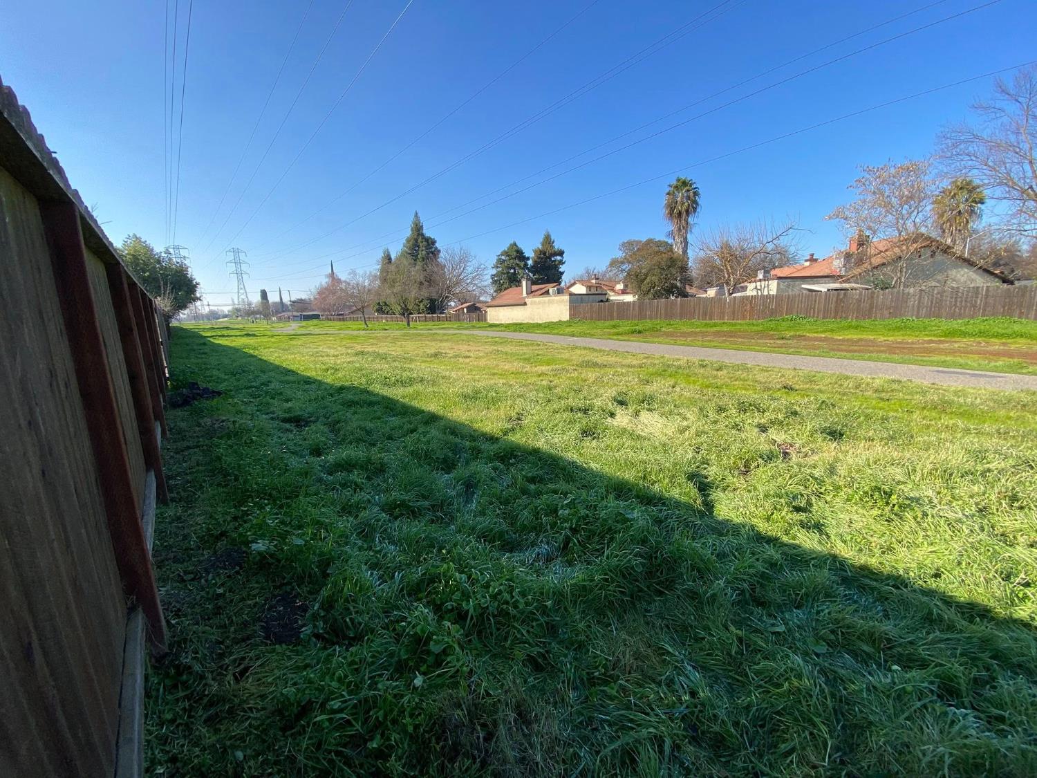 1201 Chateaugay Drive Modesto, CA 95356 - Photo 26 of 32 a view of a golf course with a lake