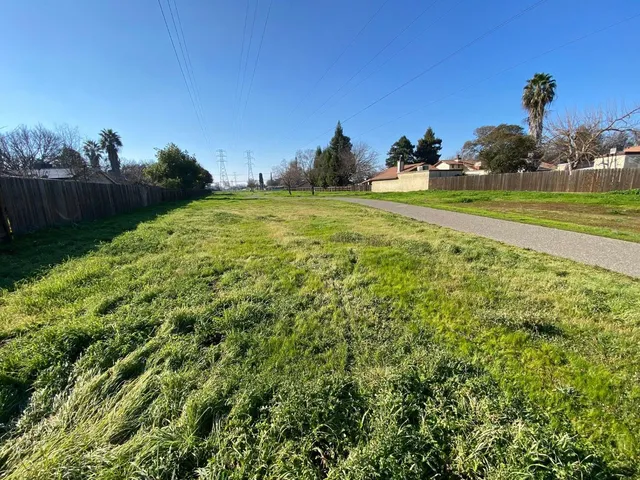 a view of a golf course with a lake