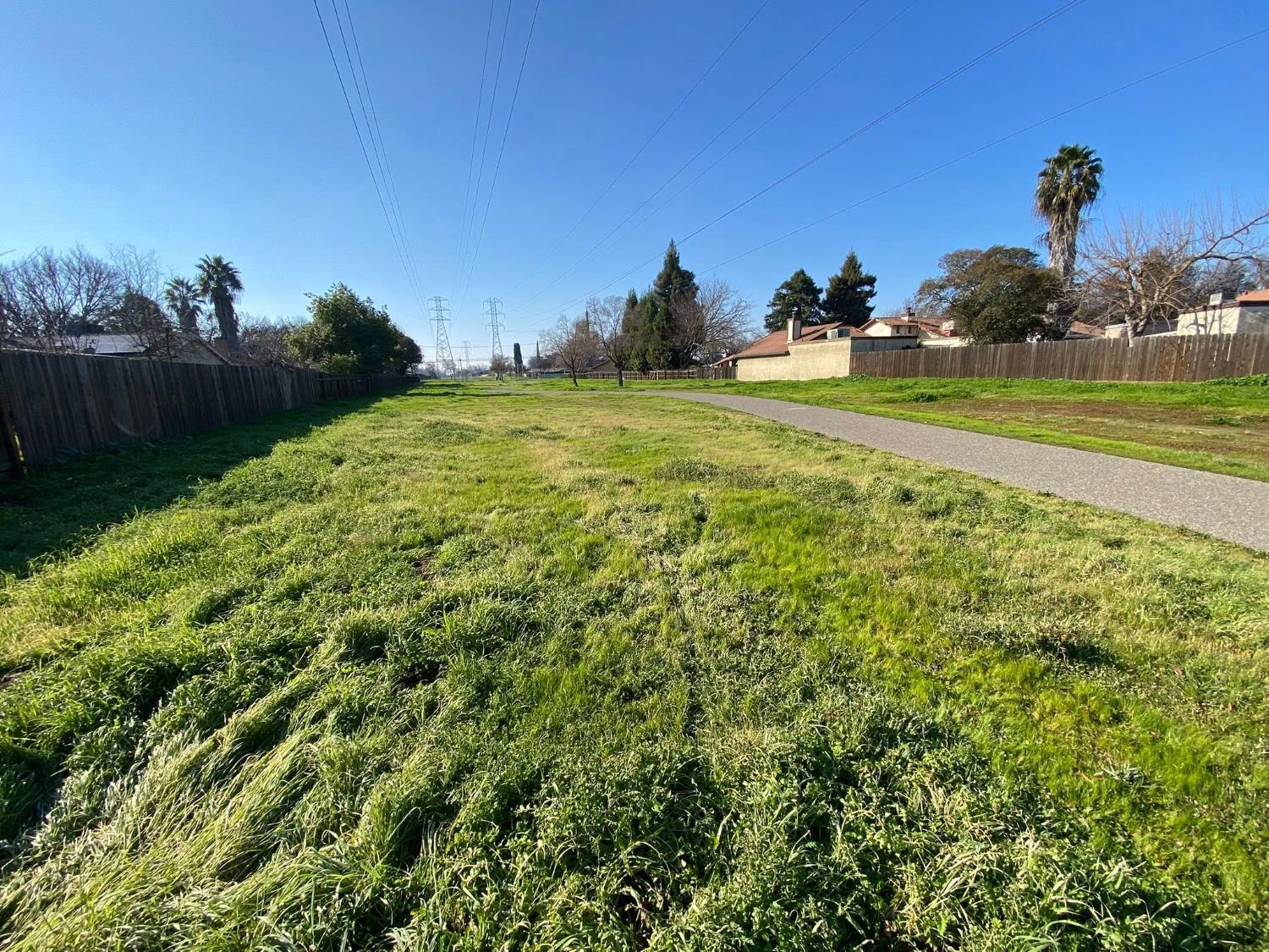 1201 Chateaugay Drive Modesto, CA 95356 - Photo 29 of 32 a view of a golf course with a lake