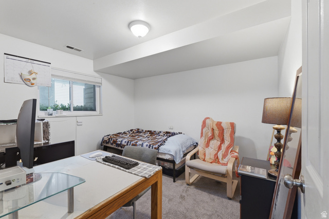 1700 Hickory Lane Provo, UT 84604 - Photo 18 of 20 Carpeted room with a recessed window, white walls, and a ceiling-mounted light fixture