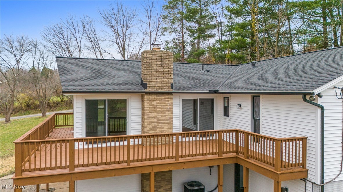 4098 State Road Medina, OH 44256 - Photo 29 of 41 Rear view of house with a deck and central AC