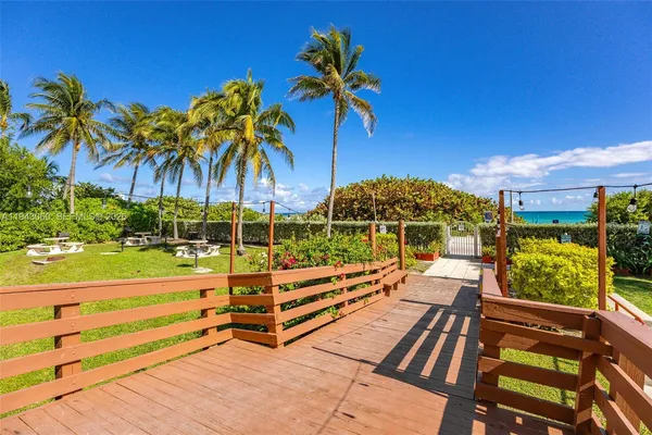 a view of a street with a building in the background