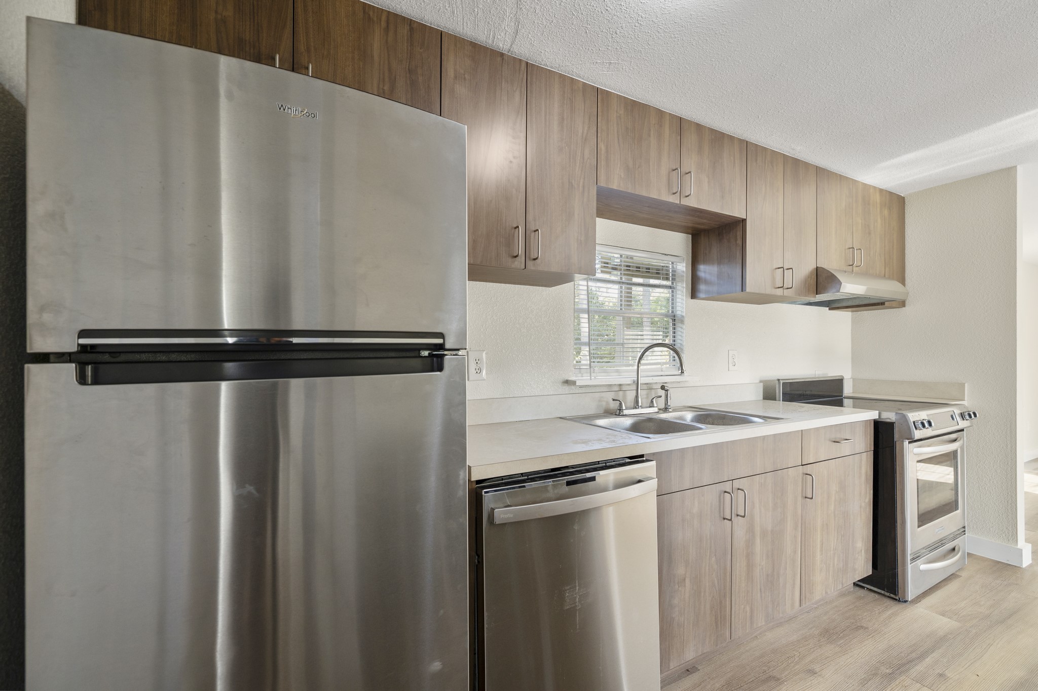 37111 Middle Trail Magnolia, TX 77354 - Photo 13 of 36 a kitchen with a sink and cabinets