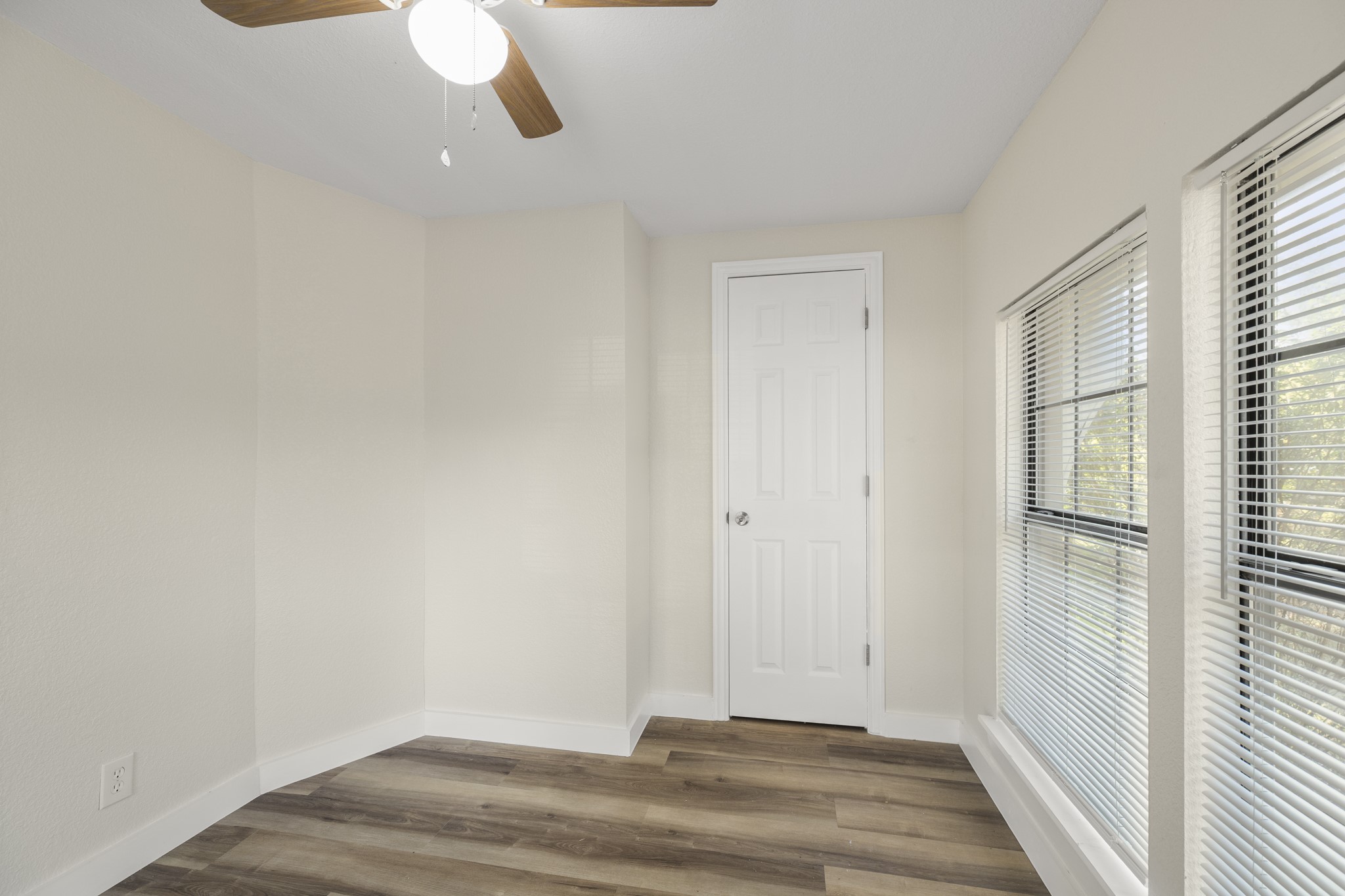 37111 Middle Trail Magnolia, TX 77354 - Photo 15 of 36 a view of a room with wooden floor and windows